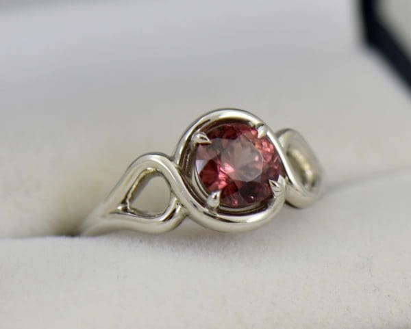 Swirly White Gold Ring with Round Tanzanian Purplish Pink Zircon.JPG