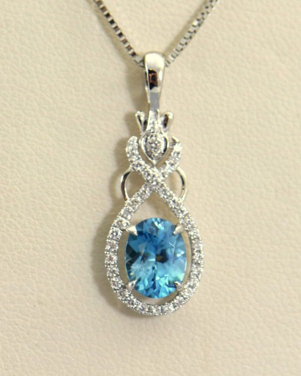 Cambodian Blue Zircon & Diamond Oval Halo Pendant