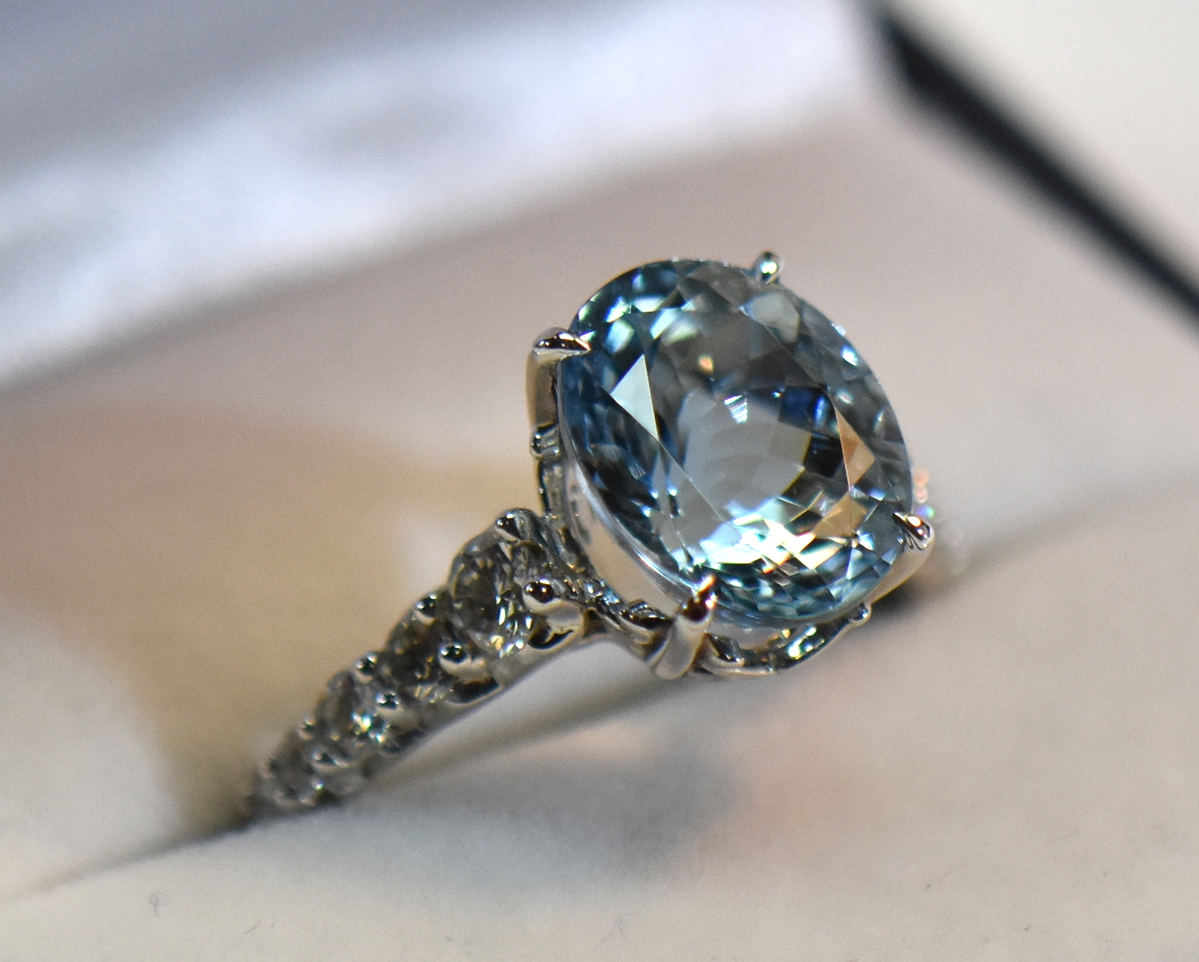 Solitaire Aquamarine Engagement Ring Emerald Cut with Petal Prongs ⋆ Laurie  Sarah