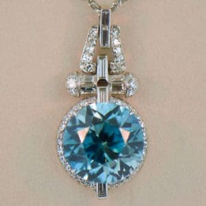 amazing 15ct round blue zircon and diamond platinum pendant