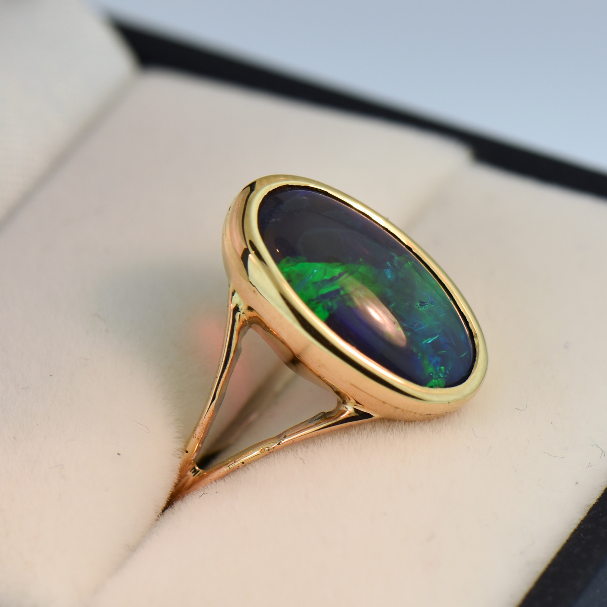 black opal gold ring