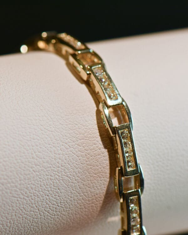 channel set yellow gold and 2ct diamond tennis bracelet 2