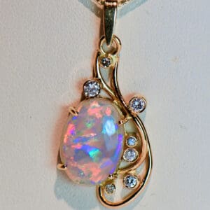 australian 18k freeform pendant with ribbon flash multicolor crystal opal