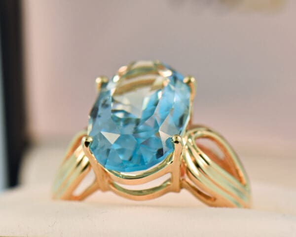 custom cut oval swiss blue topaz cocktail ring 3