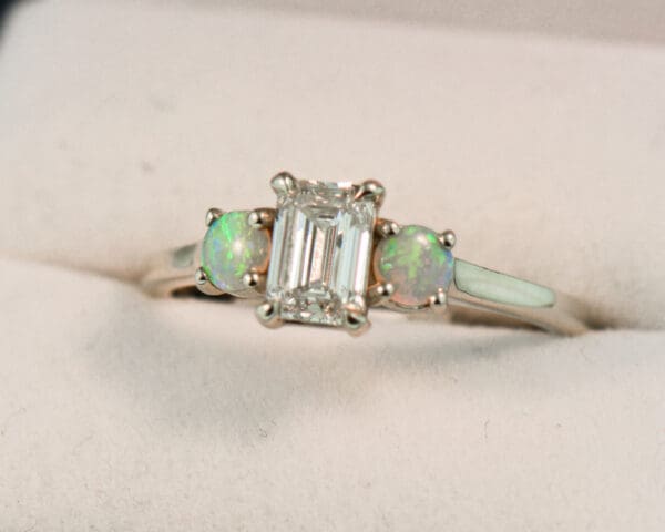 emerald cut lab created diamond and natural opal 3 stone engagement ring