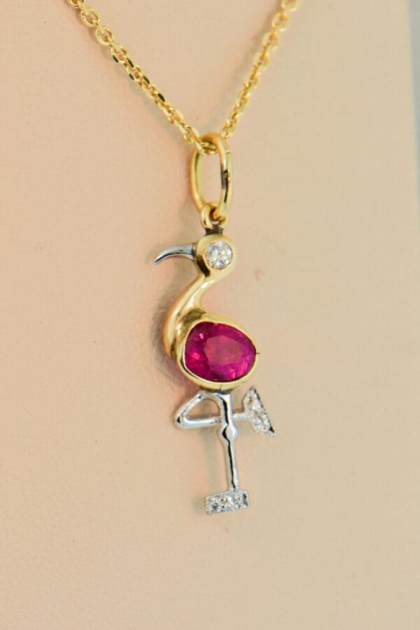 mid century modern pink flamingo pendant with neon pinkish red ruby