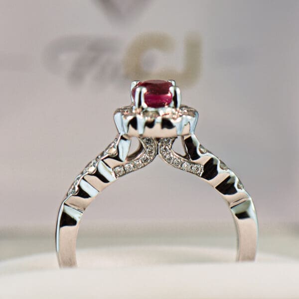 neon magenta red round burmese ruby and diamond halo ring 2