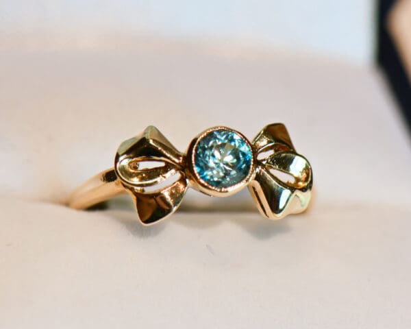 retro gold bow ring with bezel set blue zircon 3