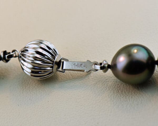 gem grade peacock hued tahitian pearl strand 2