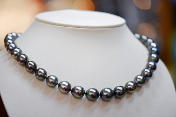 gem grade peacock hued tahitian pearl strand 3