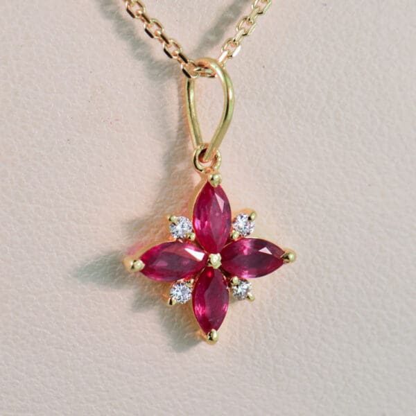 ruby clover pendant with diamond accents in 18k gold 3