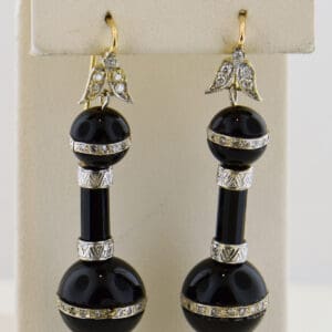 elegant art deco black onyx and diamond dangling flapper earrings