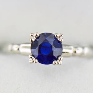 art deco royal blue sapphire platinum solitaire engagement ring