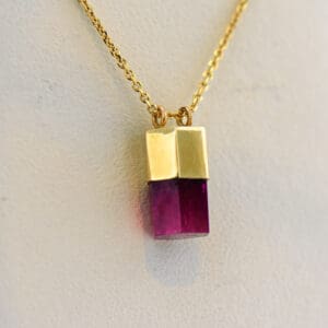 natural bixbite red beryl capped crystal pendant