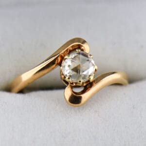 rose cut diamond and rose gold antique bypass engagement ring