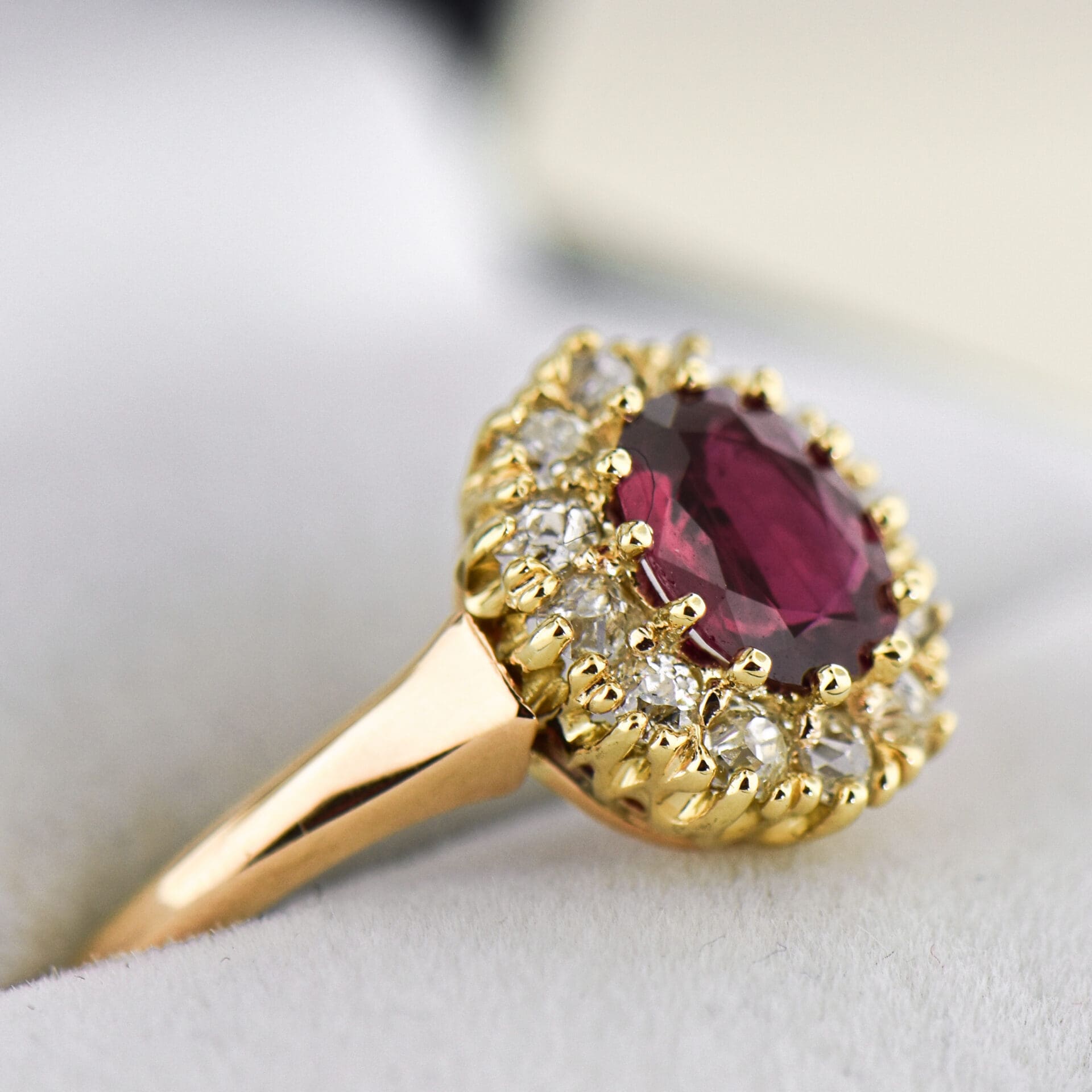 victorian maroon red ruby and diamond halo engagement ring