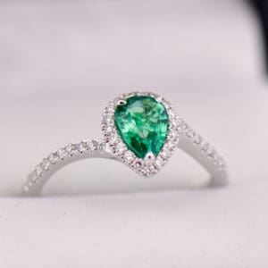 pear emerald and diamond bypass ring