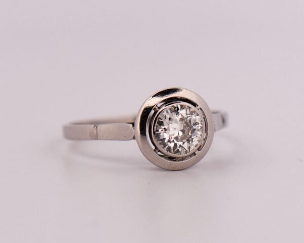 antique engagement ring with bezel set old euro diamond