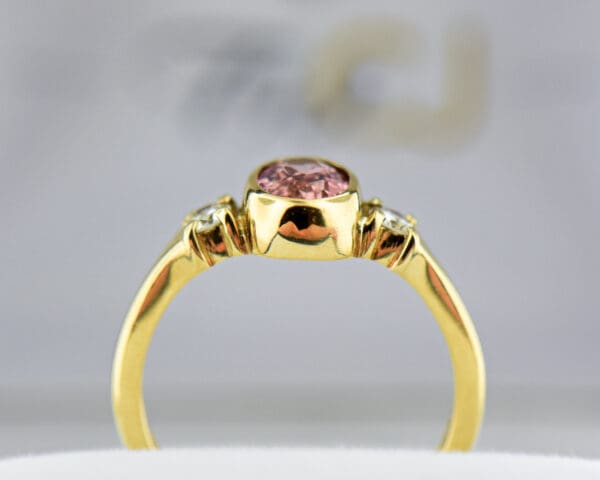 bezel set pink imperial topaz and diamond 3 stone ring 4