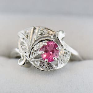 deco cluster ring with pink padparadscha sapphire and diamonds