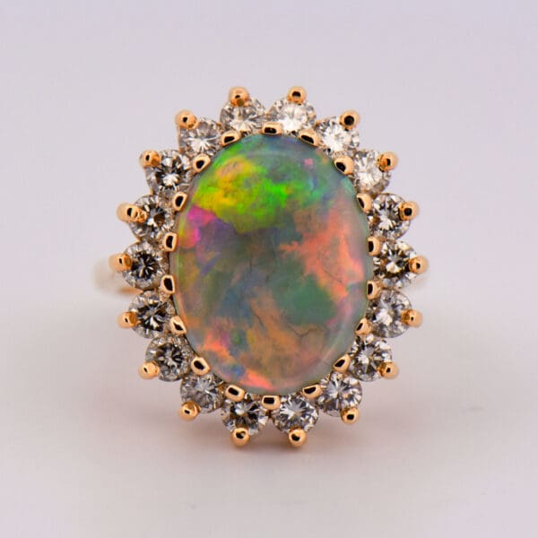 huge yellow gold opal and diamond halo cocktail ring 5