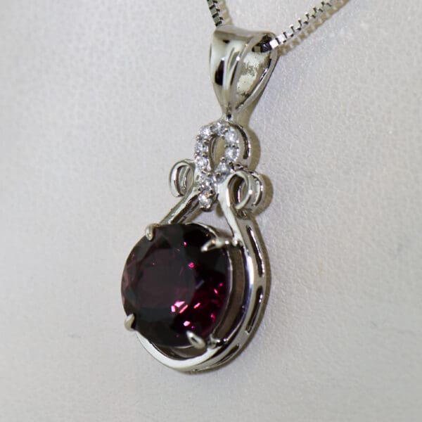 raspberry red rhodolite garnet and diamond pendant 2