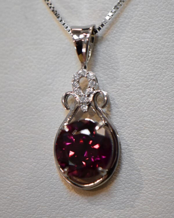 raspberry red rhodolite garnet and diamond pendant 3