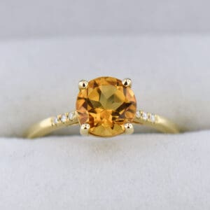 round citrine and diamond accented solitaire ring