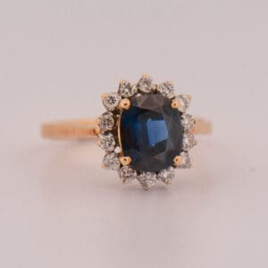 vintage cushion cut navy blue sapphire halo engagement ring