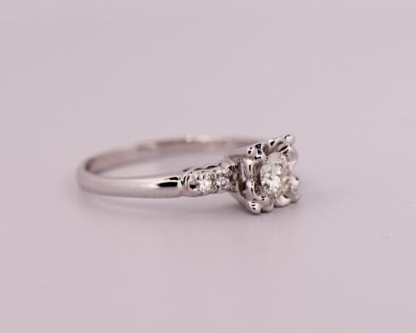 vintage white gold and diamond engagement ring with buttercup illusion setting 3