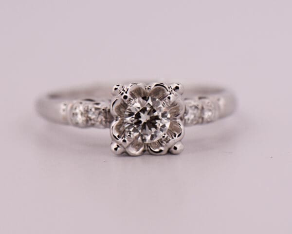 vintage white gold and diamond engagement ring with buttercup illusion setting 4