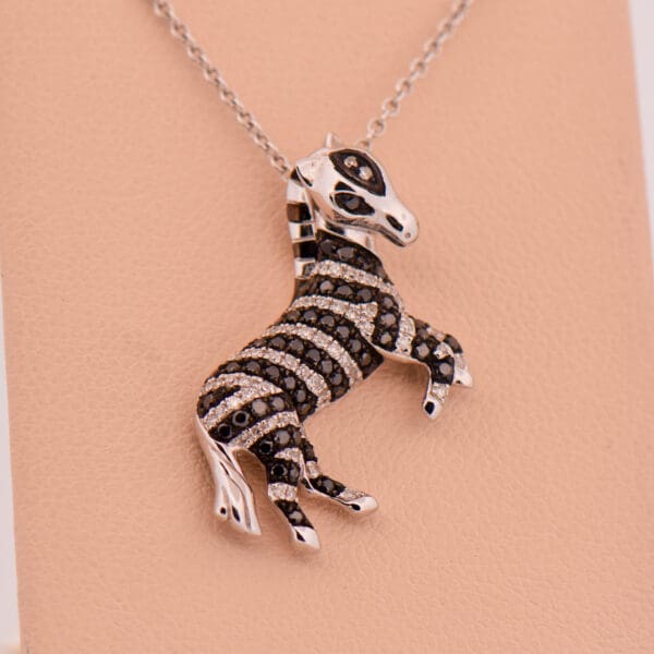 white gold and diamonds 3d figural zebra pendant