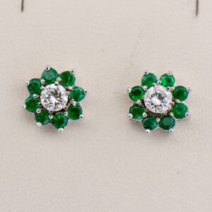 diamond stud earrings with emerald halo jackets