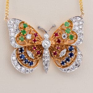 estate 18k gold diamond and gemstone set butterfly necklace