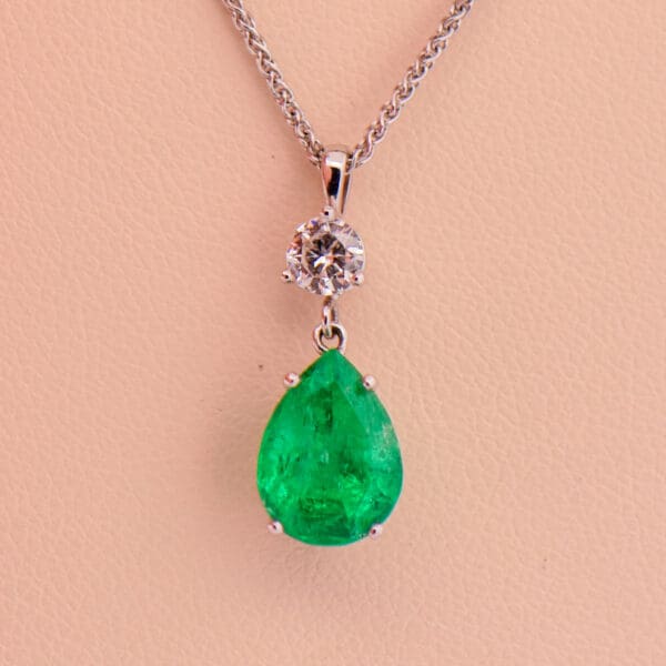 natural pear shape emerald and diamond drop pendant