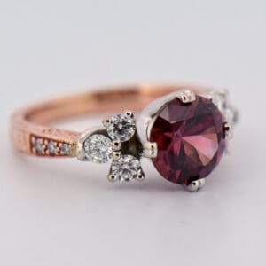 rare purple zircon ring set in rose gold mount