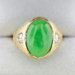 vintage gents ring with green jadeite jade and diamonds in textured gold